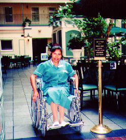 housekeeper in wheelchair